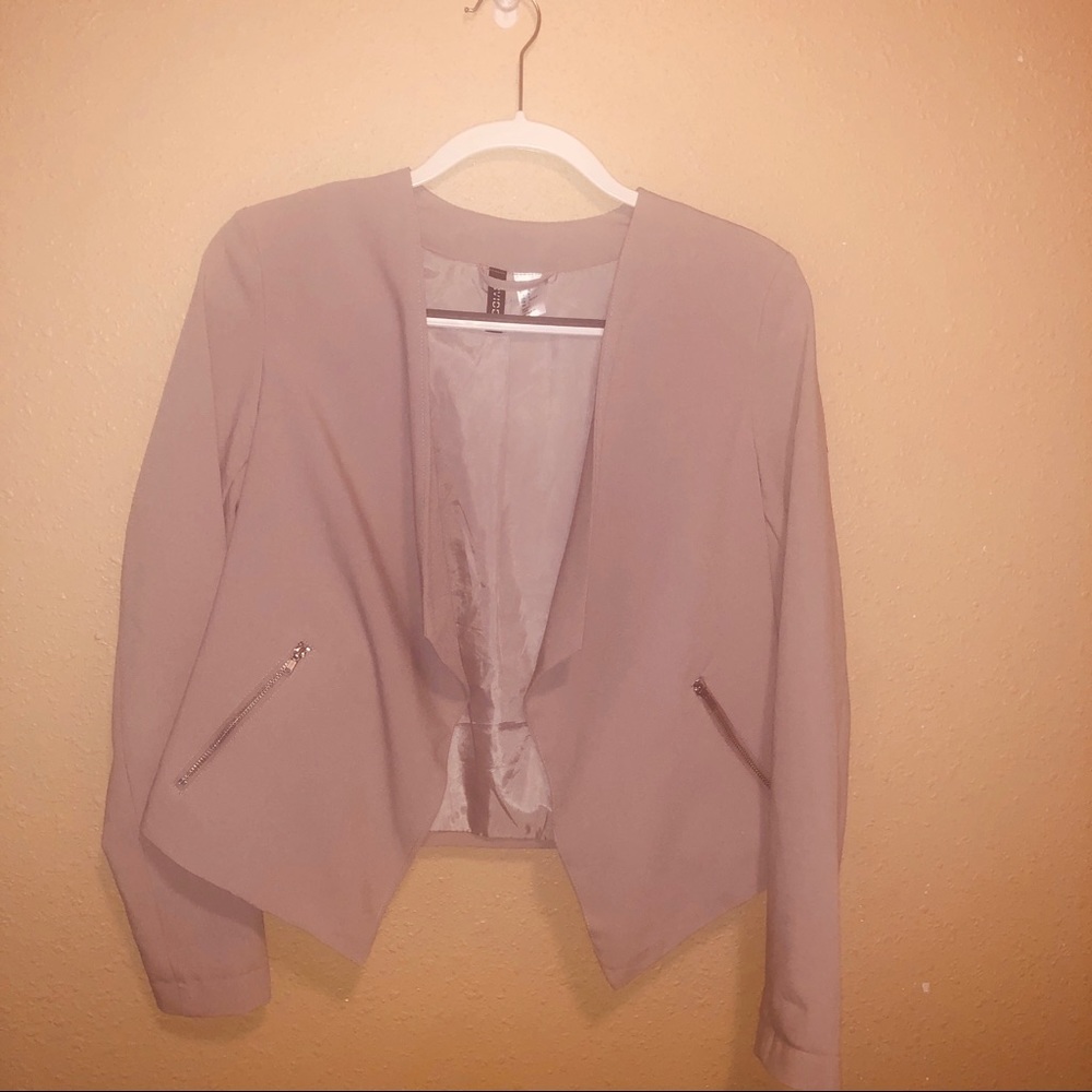 Beige blazer.